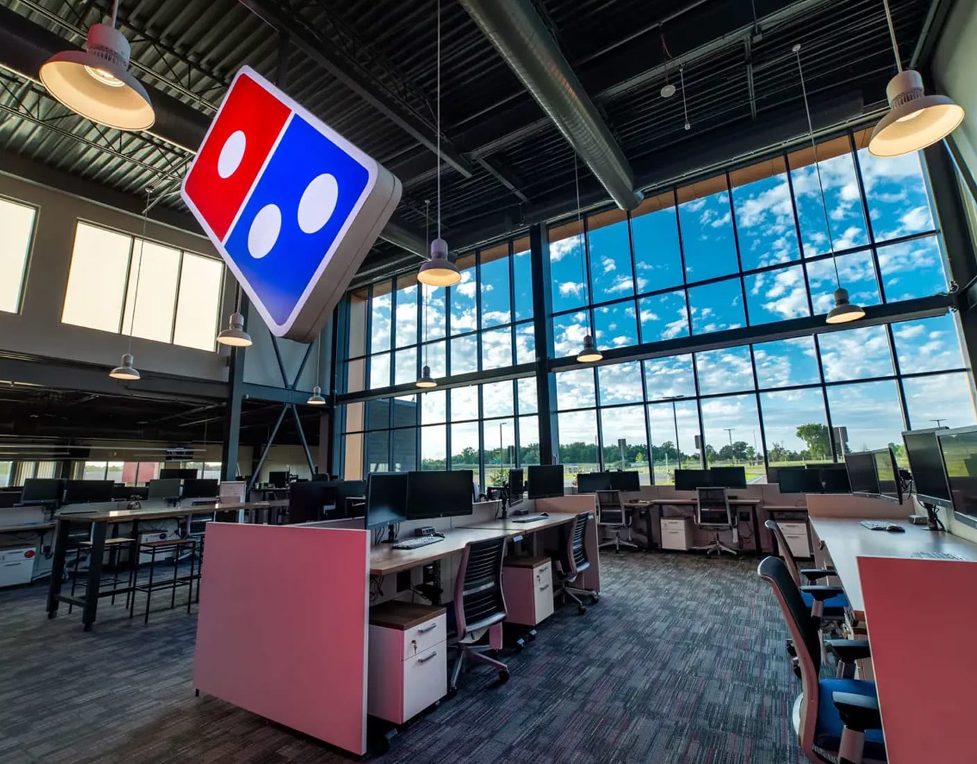 Photo of the inside of a large Domino's Pizza restaurant.